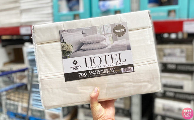 A Person Holding Members Mark Egyptian Cotton Hotel Premier Sheet Set