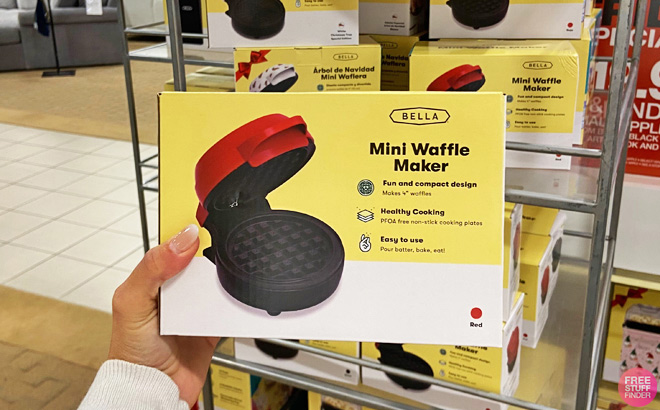 A Person Holding a Bella Mini Waffle Maker