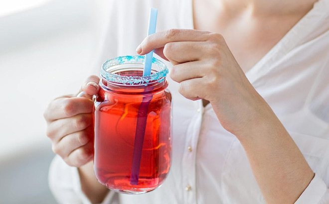 A Person Holding a Drink