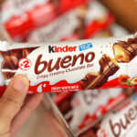 A Person Holding a Kinder Bueno Chocolate Bar