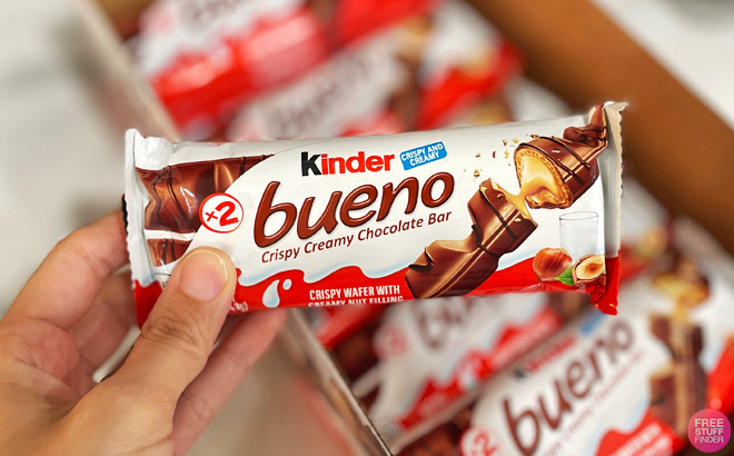 A Person Holding a Kinder Bueno Chocolate Bar