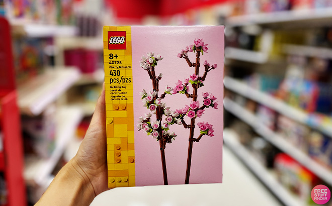 A Person Holding a Lego Cherry Blossom