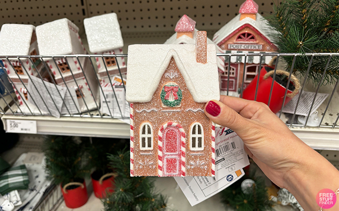 A Person Holding the Bullseyes Playground LED House Props Wreath at Target