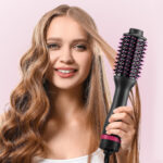 A Person Holding the MiroPure 4 in 1 Hair Dryer and Styler Volumizer Brush