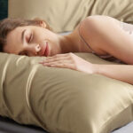 A Person Sleeping on the Bedsure Silk Pillowcase in Brown Color