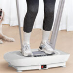 A Person Standing on Merach Vibration Plate Exercise Machine