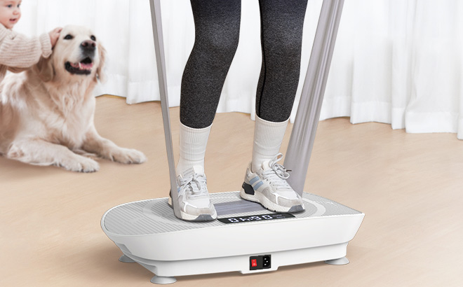 A Person Standing on Merach Vibration Plate Exercise Machine