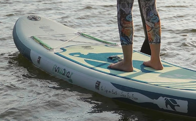 A Person Standing on the FunWater Inflatable Paddle Board