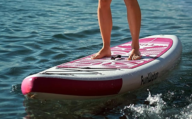 A Person Standing on the FunWater Inflatable Ultra Light Stand Up Paddle Board