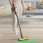 A Person Using Dyson V12 Detect Slim Cordless Vacuum Cleaner