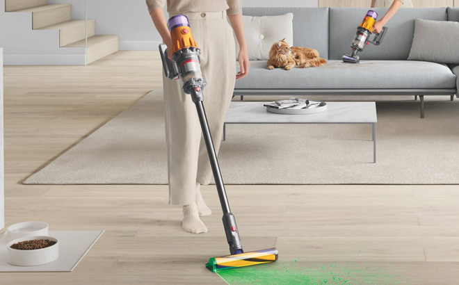 A Person Using Dyson V12 Detect Slim Cordless Vacuum Cleaner