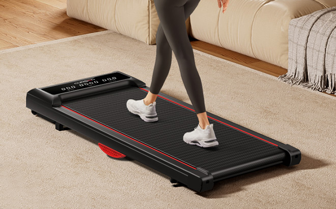 A Person Using an Under Desk Treadmill