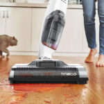 A Person Using the Tineco iFloor 2 Cordless Wet Dry Vacuum