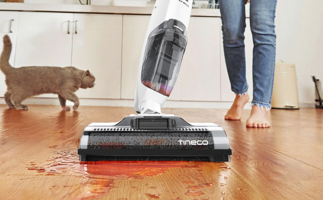 A Person Using the Tineco iFloor 2 Cordless Wet Dry Vacuum