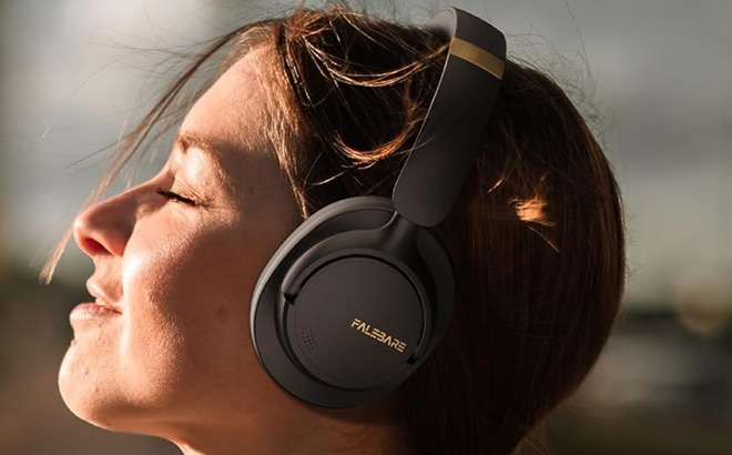 A Person Wearing Falebare Noise Cancelling Headphones