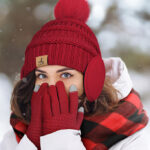 A Person Wearing Winter Hat Scarf Gloves and Ear Warmers