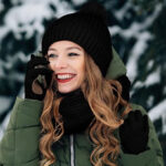 A Person Wearing Women Winter Beanie Hat Scarf Gloves Set in Black Color