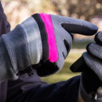 A Person Wearing the T Mobile Touchscreen Gloves While Using the Phone