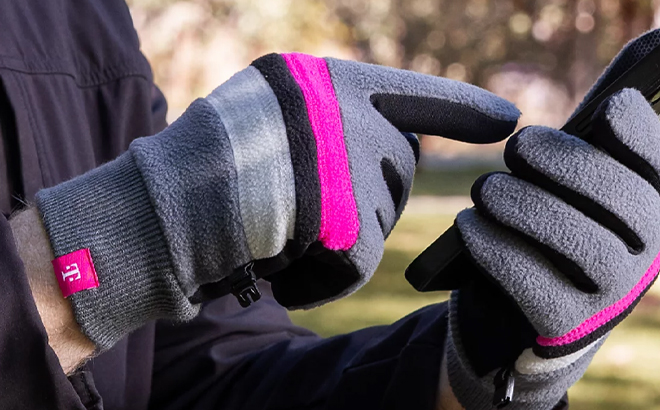 A Person Wearing the T Mobile Touchscreen Gloves While Using the Phone