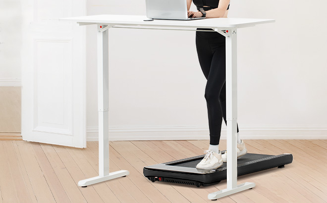 A Person Working While Using a Bifanuo Under Desk Treadmill