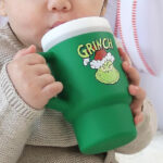 A Person drinking from Grinch Limited Edition My 1st Tumbler