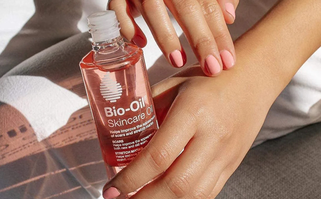 A Woman Holding Bio Oil Skincare Body Oil