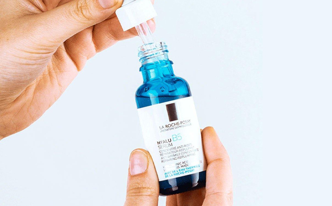 A Woman Holding La Roche Posay Hyalu B5 Pure Hyaluronic Acid Serum