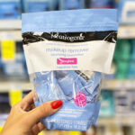 A Woman Holding Neutrogena Makeup Remover Wipes