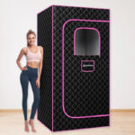 A Woman Standing Next to the AudaciaGo Full Body Portable Steam Sauna