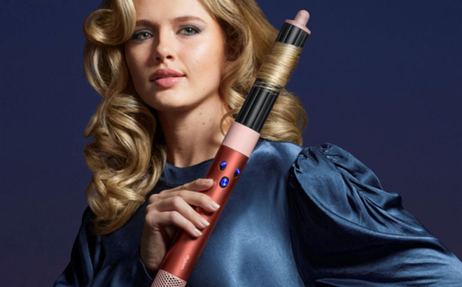 A Woman Using Dyson Special Edition Airwrap Multi Styler