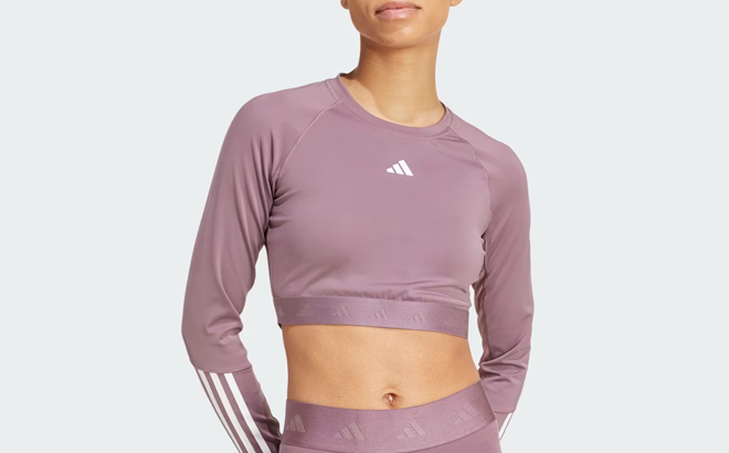 A Woman Wearing Adidas Hyperglam Training Cropped Long Sleeve Tee