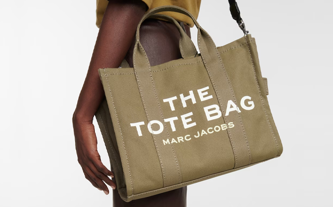 A Woman Wearing Marc Jacobs The Medium Tote Bag