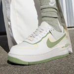 A Woman Wearing Nike Air Force 1 Shadow Shoes