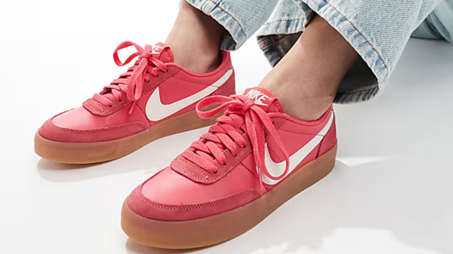 A Woman Wearing Nike Killshot Sneakers