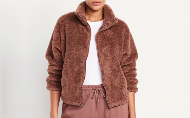 A Woman Wearing Old Navy Sherpa Zip Jacket in Warm Taupe