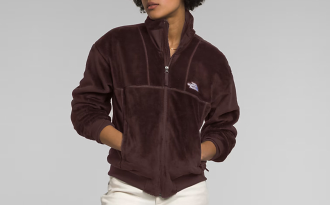 A Woman Wearing The North Face Osito Lux Full Zip Fleece Jacket