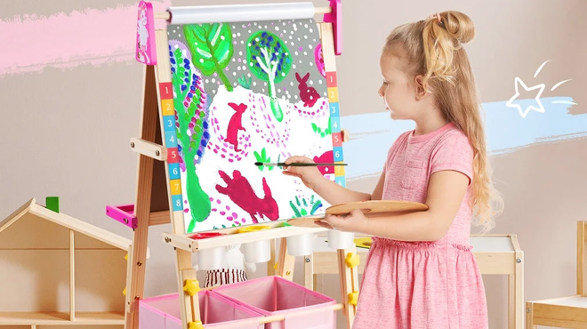 A child painting on a Keenstone Unicorn Art Easel for Kids