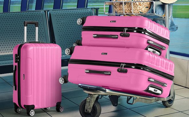 A pink Zimtown 3 Piece Spinner Suitcase