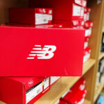 Box with New Balance Shoes