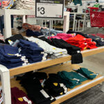 Cat Jack Kids Leggings on Shelves with a Black Friday Sale Sign at Target