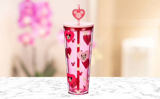 Disney Mickey and Minnie Mouse Valentines Day Starbucks Tumbler on a Table