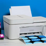 HP Printer with 25 Instant Ink Card on a Table