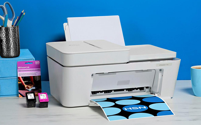 HP Printer with 25 Instant Ink Card on a Table