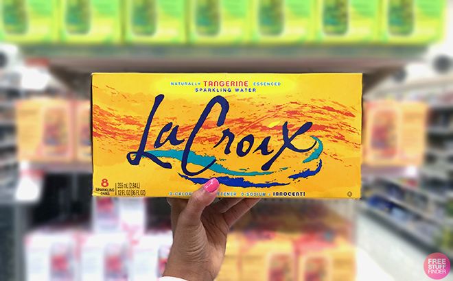 Hand holding a LaCroix Sparkling Water Tangerine