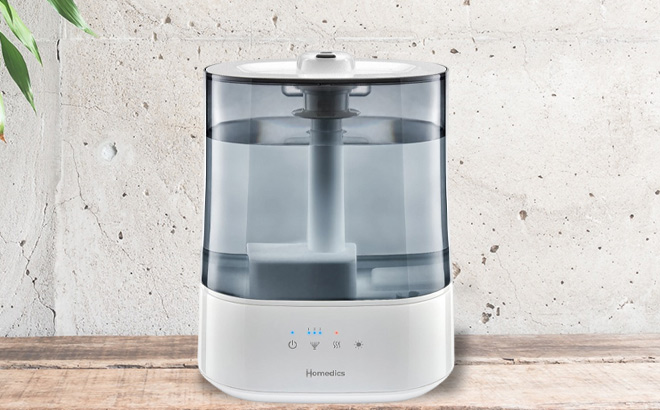 HoMedics Warm and Cool Mist Ultrasonic Humidifier on a Table