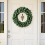 Holiday Time Basic Artificial Christmas Wreath on a Front Door