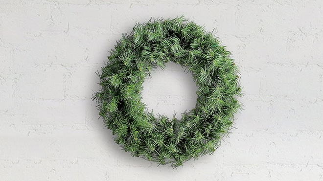 Holiday Time Basic Artificial Christmas Wreath on a Wall