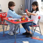 Kids Playing using a Marvel Spiderman Kids 3 Piece Table and Chairs Set