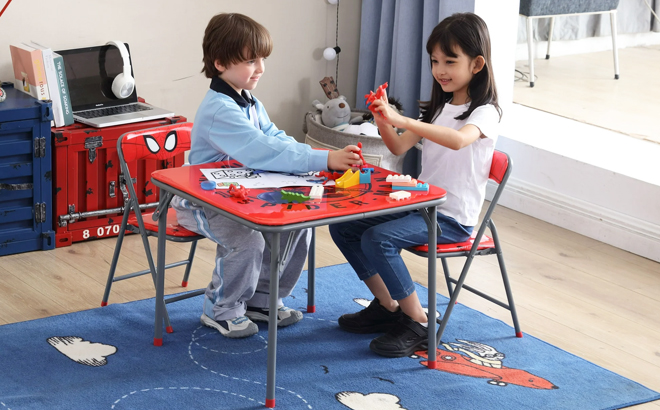 Kids Playing using a Marvel Spiderman Kids 3 Piece Table and Chairs Set