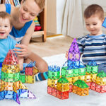 Kids are Playing with Magnetic Tiles Toys on the Floor